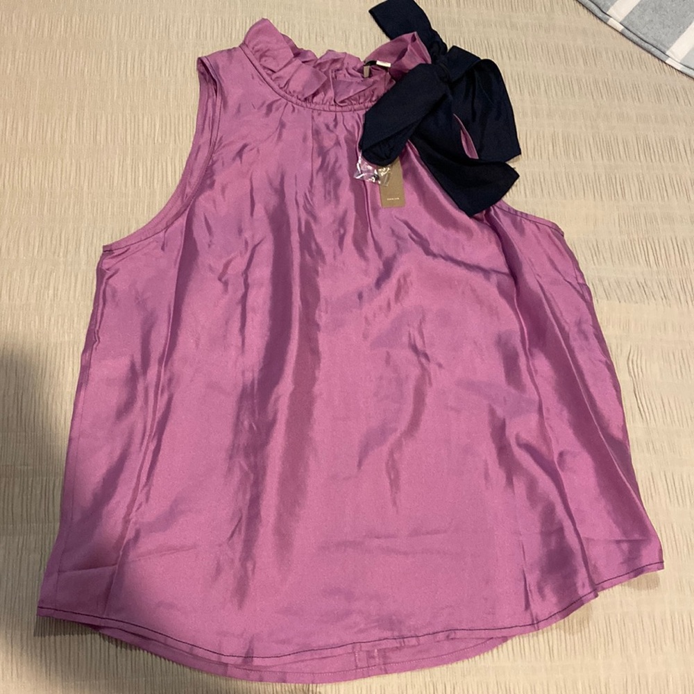 Lavender with navy bow. Never worn